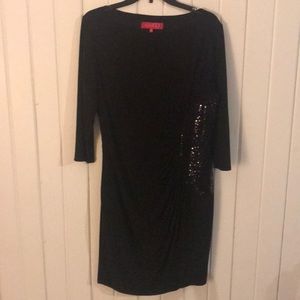 Fitted black dress with sequins